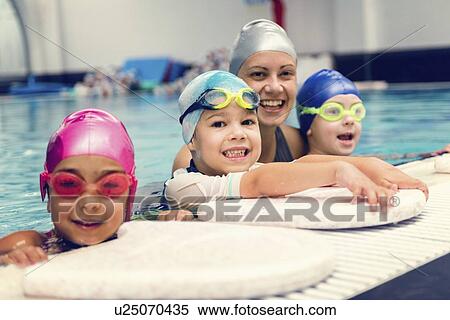 Stock Photography - Group swimming lesson. Fotosearch