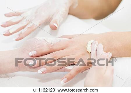 Hand cream application View Large Photo Image Stock Image - Hand cream application. Fotosearch