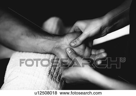 Hand massage View Large Photo Image Stock Photo - Hand massage. Fotosearch