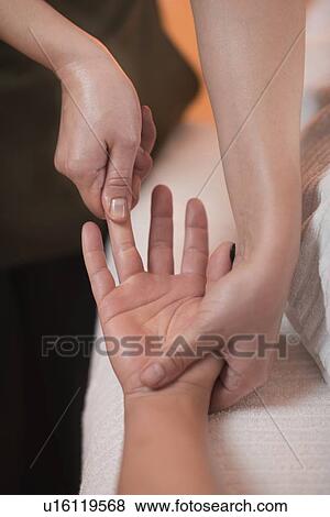 Stock Photo - Hand Sports Massage Therapy. Fotosearch
