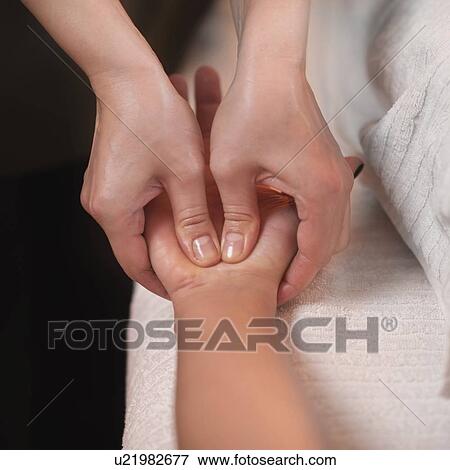Stock Photo - Hand Sports Massage Therapy. Fotosearch