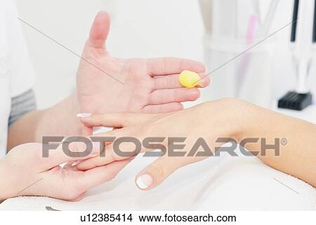 Picture - Hand treatment. Fotosearch