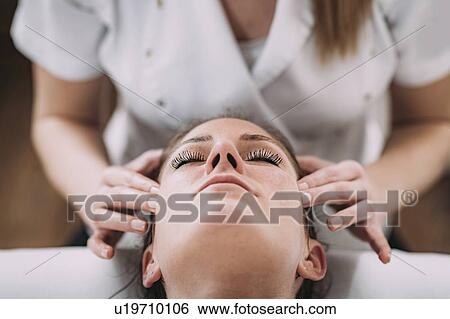 Stock Photograph - Head massage. Fotosearch