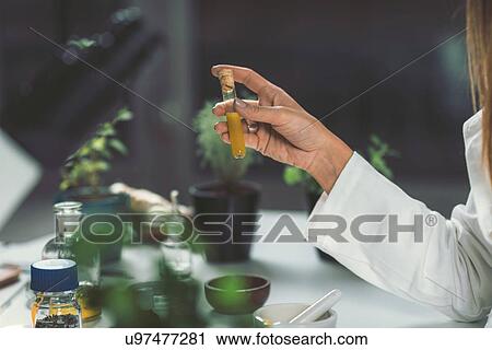 Stock Image - Homeopathic remedy preparation. Fotosearch