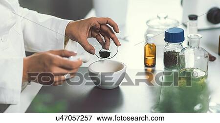 Homeopathic remedy preparation View Large Photo Image Stock Photo - Homeopathic remedy preparation. Fotosearch