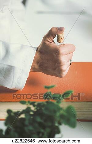 Stock Photograph - Homeopathic remedy preparation. Fotosearch
