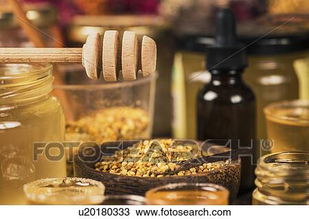 Stock Image - Honey and honey bee products. Fotosearch