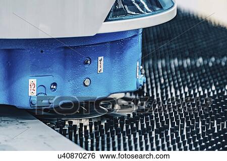 Stock Photograph - Hybrid punching machine. Fotosearch