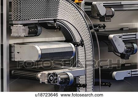 Industrial conveyor system View Large Photo Image Stock Photograph - Industrial conveyor system. Fotosearch