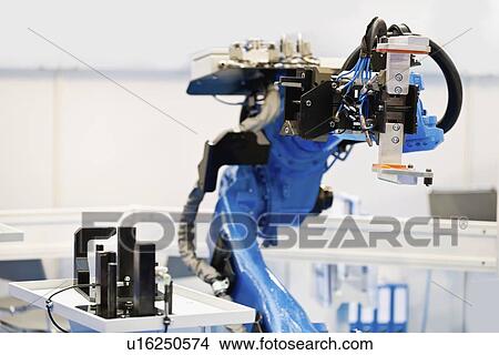 Picture - Industrial robotic arm. Fotosearch