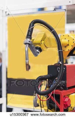 Stock Photo - Industrial robotic arm. Fotosearch