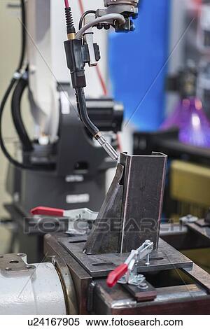 Stock Photography - Industrial robotic arm. Fotosearch