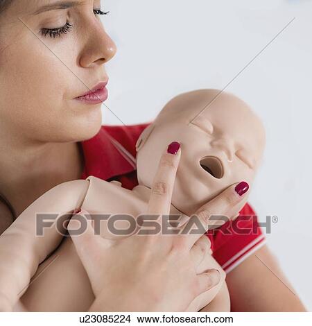 Infant cardiopulmonary resuscitation training View Large Photo Image Picture - Infant cardiopulmonary resuscitation training. Fotosearch