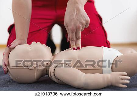 Infant cardiopulmonary resuscitation training View Large Photo Image Stock Photograph - Infant cardiopulmonary resuscitation training. Fotosearch