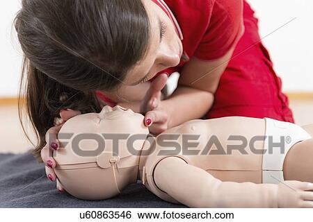 Infant cardiopulmonary resuscitation training View Large Photo Image Stock Photograph - Infant cardiopulmonary resuscitation training. Fotosearch
