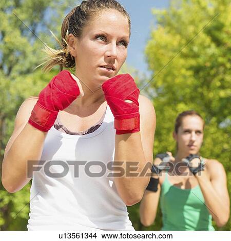 Picture - Kickboxing training outdoors. Fotosearch