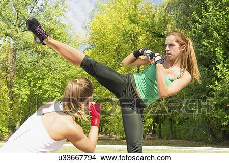 Kickboxing training outdoors View Large Photo Image Picture - Kickboxing training outdoors. Fotosearch