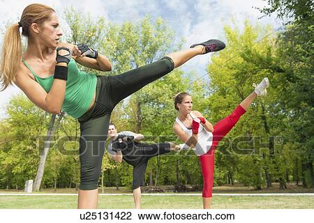 Kickboxing training outdoors View Large Photo Image Stock Image - Kickboxing training outdoors. Fotosearch