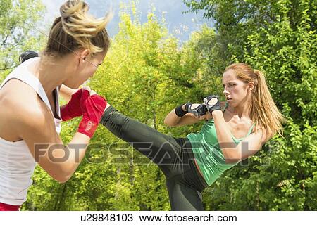 Kickboxing training outdoors View Large Photo Image Stock Image - Kickboxing training outdoors. Fotosearch