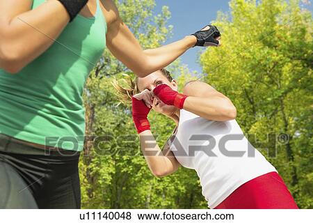 Kickboxing training outdoors View Large Photo Image Stock Photo - Kickboxing training outdoors. Fotosearch