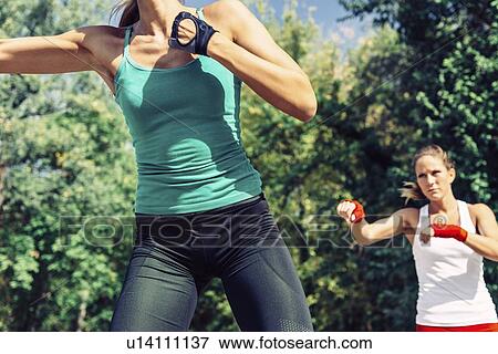 Kickboxing training outdoors View Large Photo Image Stock Photo - Kickboxing training outdoors. Fotosearch