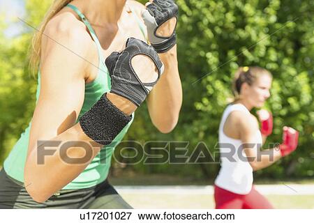 Kickboxing training outdoors View Large Photo Image Stock Photo - Kickboxing training outdoors. Fotosearch