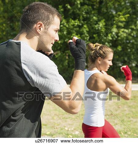Kickboxing training outdoors View Large Photo Image Stock Photo - Kickboxing training outdoors. Fotosearch