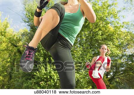 Kickboxing training outdoors View Large Photo Image Stock Photo - Kickboxing training outdoors. Fotosearch