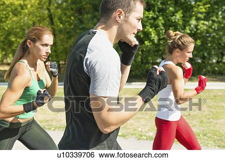 Kickboxing training outdoors View Large Photo Image Stock Photograph - Kickboxing training outdoors. Fotosearch