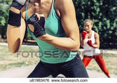 Kickboxing training outdoors View Large Photo Image Stock Photograph - Kickboxing training outdoors. Fotosearch