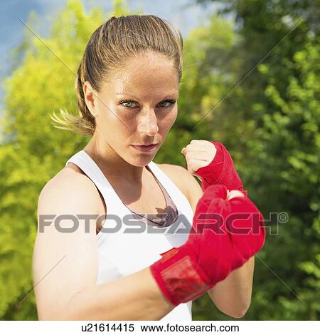 Stock Photography - Kickboxing training outdoors. Fotosearch