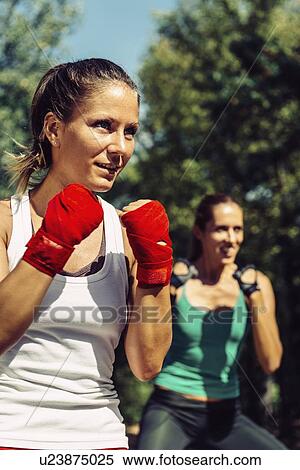 Kickboxing training outdoors View Large Photo Image Stock Photography - Kickboxing training outdoors. Fotosearch