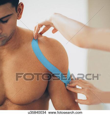 Kinesio tape application View Large Photo Image Picture - Kinesio tape application. Fotosearch