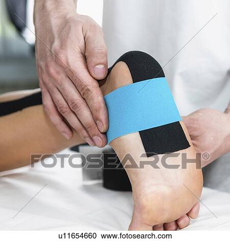 Kinesio tape application View Large Photo Image Stock Image - Kinesio tape application. Fotosearch