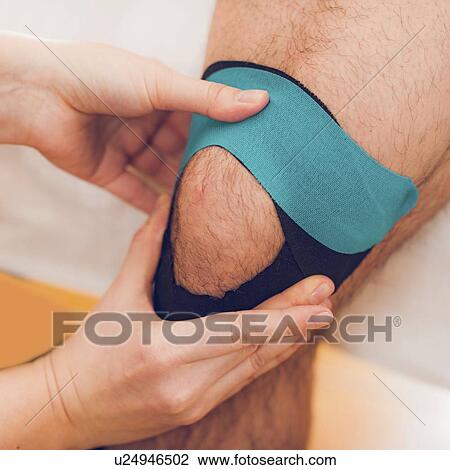 Kinesio tape application View Large Photo Image Stock Image - Kinesio tape application. Fotosearch