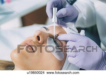 Picture - Lash lifting in beauty salon. Fotosearch