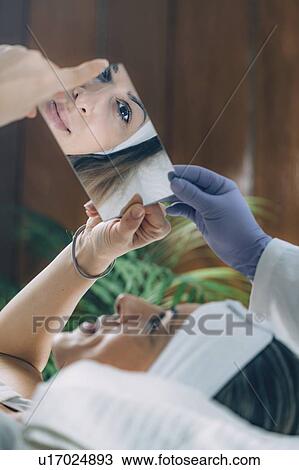 Stock Image - Lash lifting in beauty salon. Fotosearch