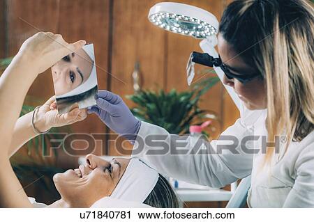 Stock Image - Lash lifting in beauty salon. Fotosearch
