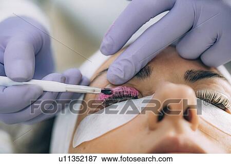 Stock Photo - Lash lifting in beauty salon. Fotosearch