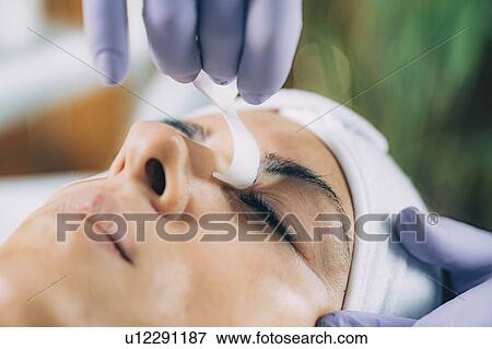 Stock Photo - Lash lifting in beauty salon. Fotosearch