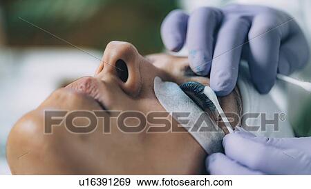 Stock Photo - Lash lifting in beauty salon. Fotosearch