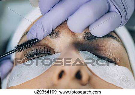 Stock Photo - Lash lifting in beauty salon. Fotosearch