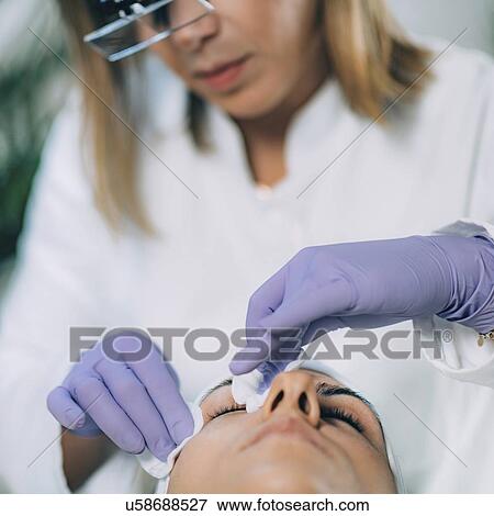 Stock Photo - Lash lifting in beauty salon. Fotosearch