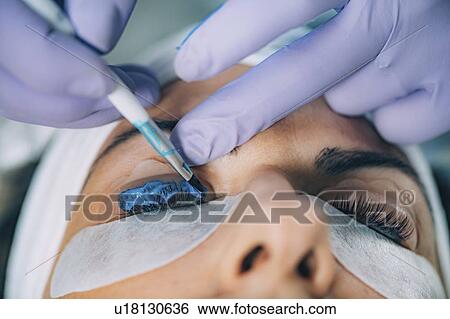 Stock Photograph - Lash lifting in beauty salon. Fotosearch