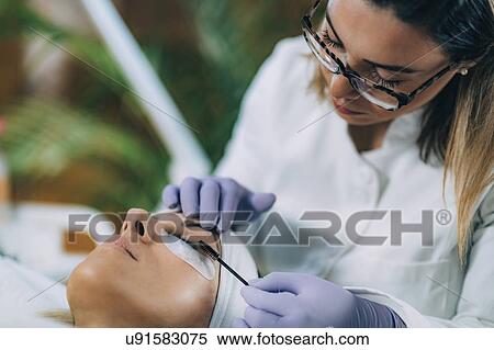 Stock Photography - Lash lifting in beauty salon. Fotosearch