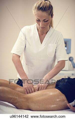 Leg massage View Large Photo Image Stock Image - Leg massage. Fotosearch