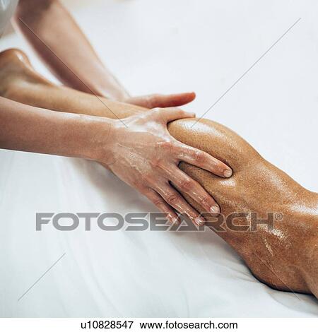Leg massage View Large Photo Image Stock Photo - Leg massage. Fotosearch
