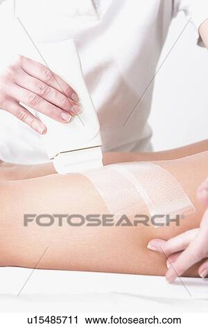 Leg waxing View Large Photo Image Stock Image - Leg waxing. Fotosearch