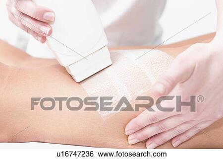 Leg waxing View Large Photo Image Stock Photograph - Leg waxing. Fotosearch