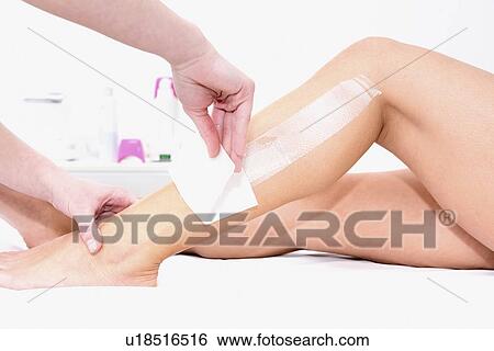 Stock Photograph - Leg waxing. Fotosearch
